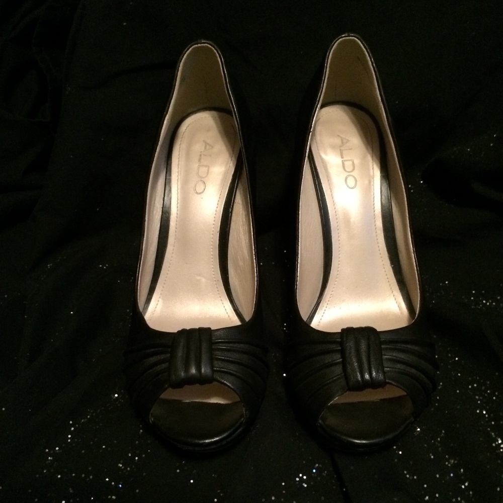Aldo black high heels size 38, which is a size 7US